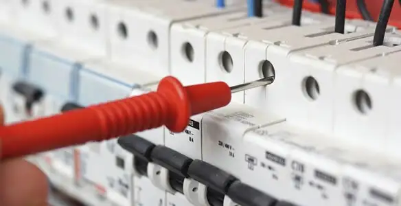 Electrical contractor testing circuit breakers during electrical repair in Mechanicsburg, PA