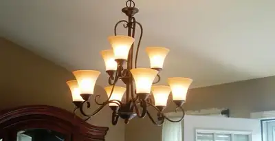 Classic ceiling chandelier installation with warm lighting in Harrisburg, PA