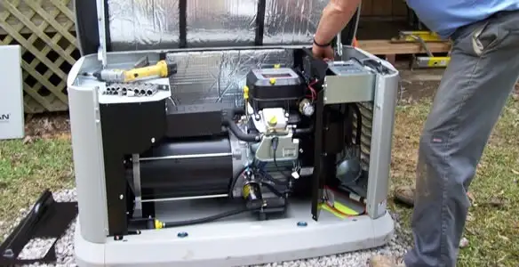 generator installation service showing technician connecting and configuring generator components in Harrisburg, PA