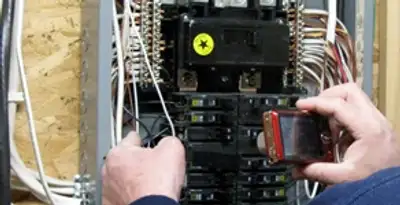 Home electrical inspection of circuit breaker panel by licensed electrician in Harrisburg, PA
