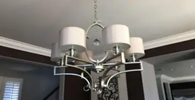 Modern chandelier installation with multiple light fixtures in Harrisburg, PA