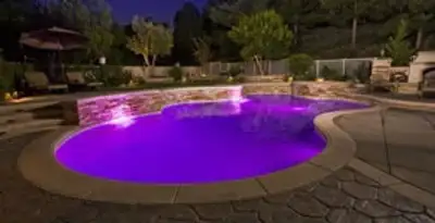 pool light installation and repair services illuminating a residential swimming pool in Harrisburg, PA