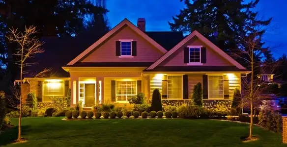 security light installation services illuminating a residential exterior at night in Harrisburg, PA