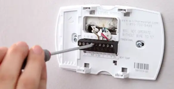 Thermostat installation service with proper wiring and secure wall mounting in Harrisburg, PA